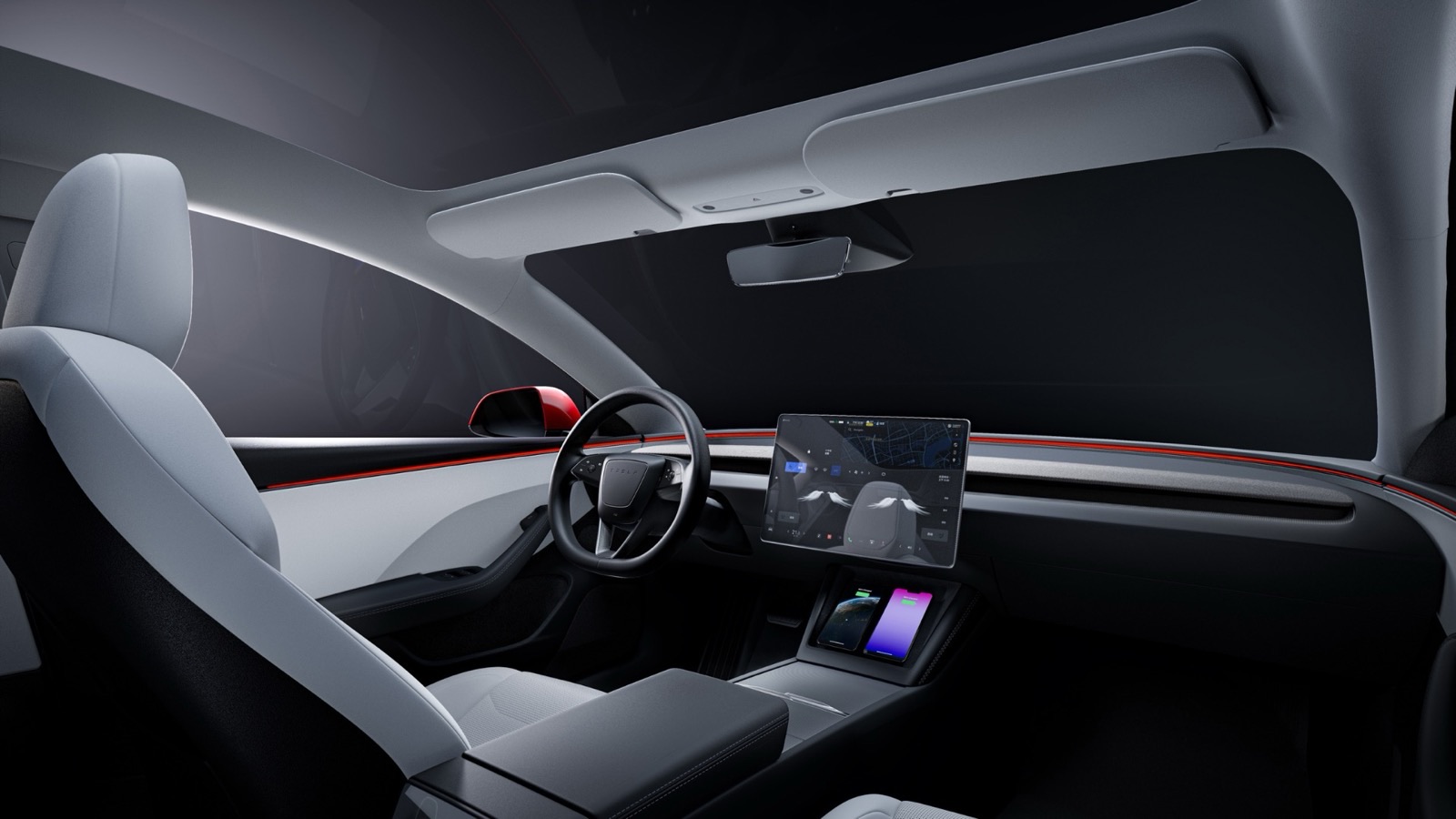 Interior de un Tesla Model 3 con la pantalla central encendida
